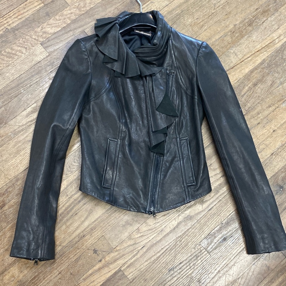 Diane Von Furstenberg exquisite, leather jacket, ruffled collar full zip sleeves